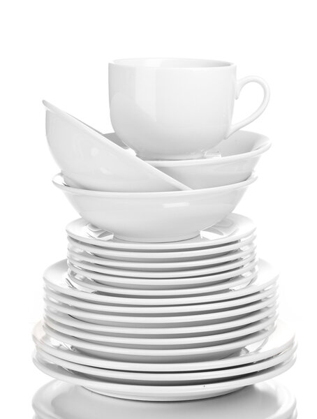 Clean plates and cups isolated on white