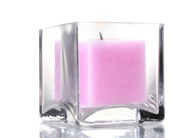 Beautiful purple candle isolated on white clipart