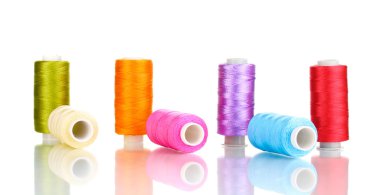Many spools of thread isolated on white clipart