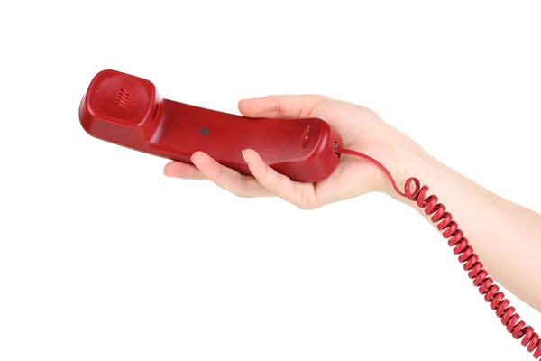 Sluchátko červený telefon v ruce izolovaných na bílém — Stock fotografie