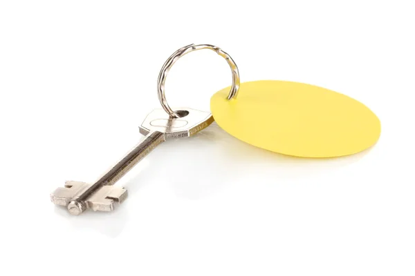 Key with charm isolated on white — Stock Photo, Image