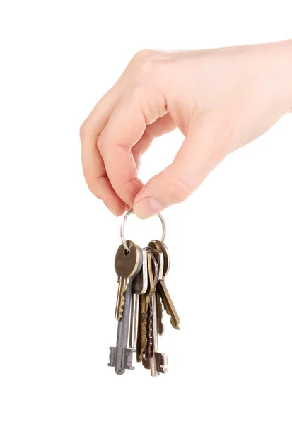 Pęk kluczy w ręku na białym tle — Zdjęcie stockowe