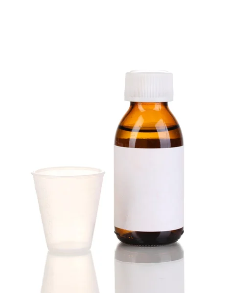 Botella médica y jigger aislados en blanco — Foto de Stock