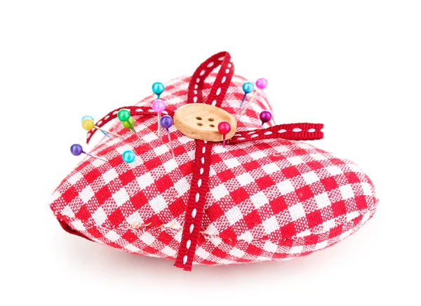 Kolorowe pinheads w pin Poduszka na białym tle — Zdjęcie stockowe