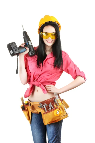 Beautiful young girl-builder holding drill isolated on white — Stock Photo, Image