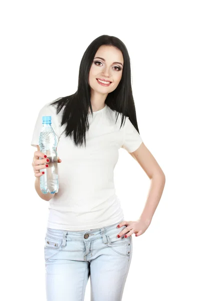 Bela jovem e garrafa de água isolada em branco — Fotografia de Stock