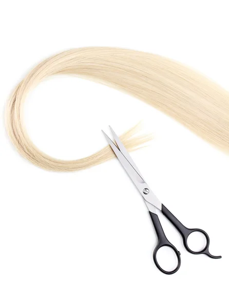Shiny blond hair and hair cutting shears isolated on white Stock Photo