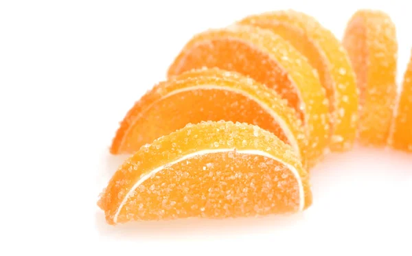 Caramelle gelatina d'arancia isolate su bianco — Foto Stock