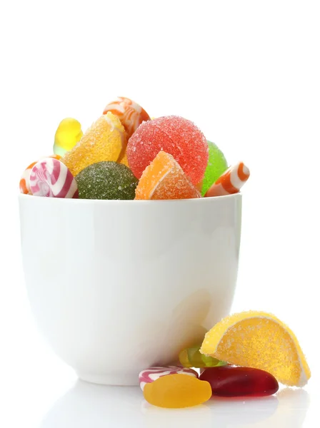 Kleurrijke gelei snoepjes in kom geïsoleerd op wit — Stockfoto