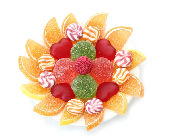 Colorful jelly candies on plate isolated on white — Stock Photo, Image