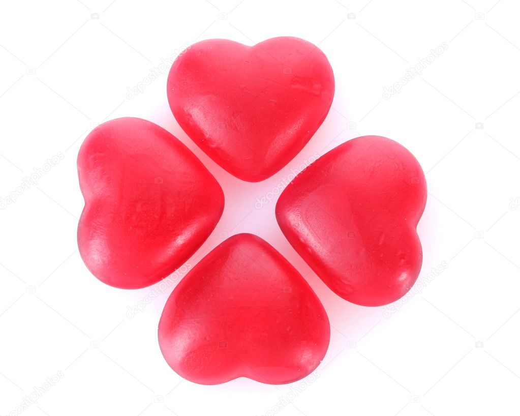 Red candy hearts isolated on white