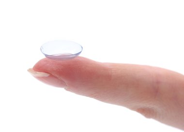 Contact lens on finger isolated on white clipart