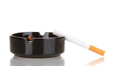 Cigarette butts in ashtray isolateed on white clipart