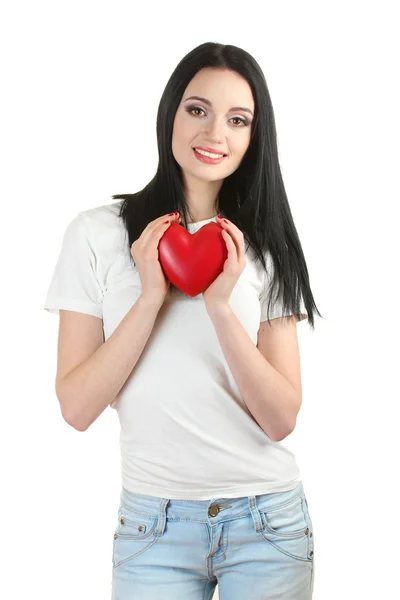 Beautiful young girl holding red heart isolated on white — Stock Photo, Image