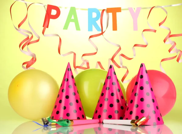 Party items on green background — Stock Photo, Image