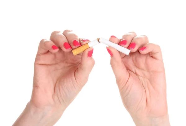 Sigaretta in femmina isolata a mano su bianco — Foto Stock