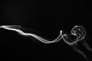 Abstract smoke on black background clipart