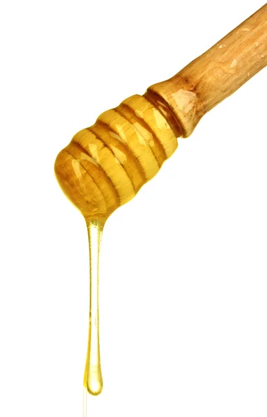 Mel de madeira dipper com mel isolado em branco — Fotografia de Stock