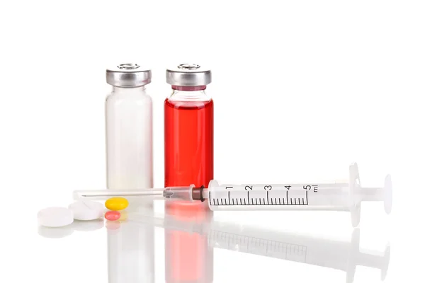 Syringe with medical ampoule and tablets isolated on white — Stock Photo, Image