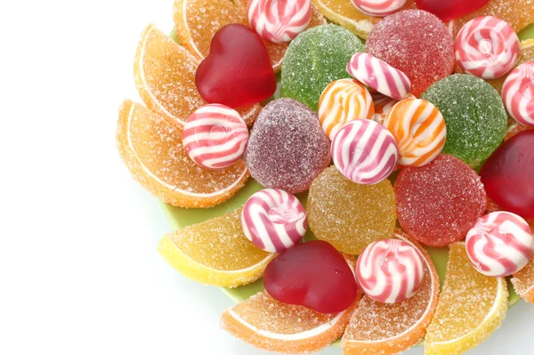 Caramelos de jalea de colores en el plato aislado en blanco — Foto de Stock
