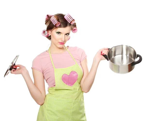Beautiful young housewife with a pan isolated on white — Stock Photo, Image