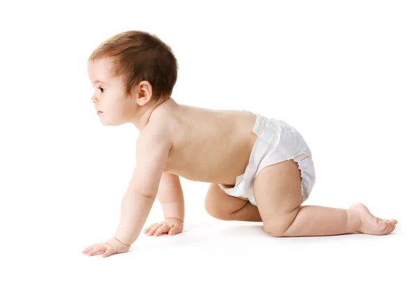 Cute baby girl crawling isolated on white — Stock Photo, Image
