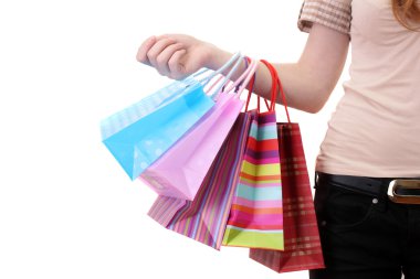 parlak alışveriş torbaları üzerinde beyaz izole tutmak el