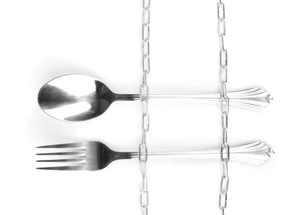 stock image Fork and spoon with chain isolated on white