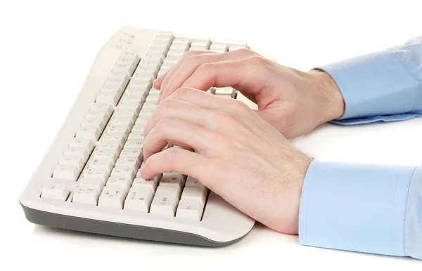 Mani maschili digitando sulla tastiera isolata su bianco — Foto Stock