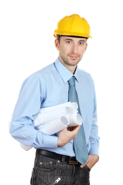 Genç adam mimar ile kask ve taslaklar üzerinde beyaz izole — Stok fotoğraf