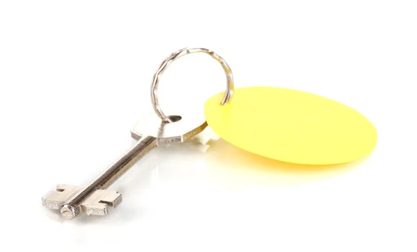 Anahtar üzerinde beyaz izole cazibe ile — Stok fotoğraf