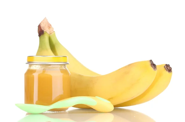 Джар дитячого пюре з бананами і ложкою ізольовані на білому — стокове фото