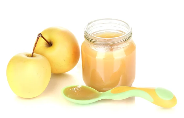 Jar of baby puree with apple and spoon isolated on white — Stock Photo, Image