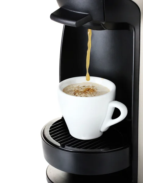 Espresso machine pouring coffee in cup isolated on white — Stock Photo, Image