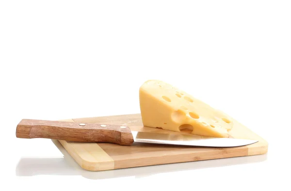 Cheese on cutting board with knife isolated on white Stock Photo