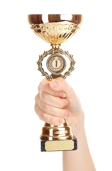 Coppa trofeo in mano isolata su bianco — Foto Stock