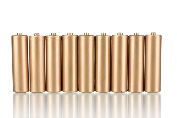 Zlatá baterie izolovaných na bílém — Stock fotografie