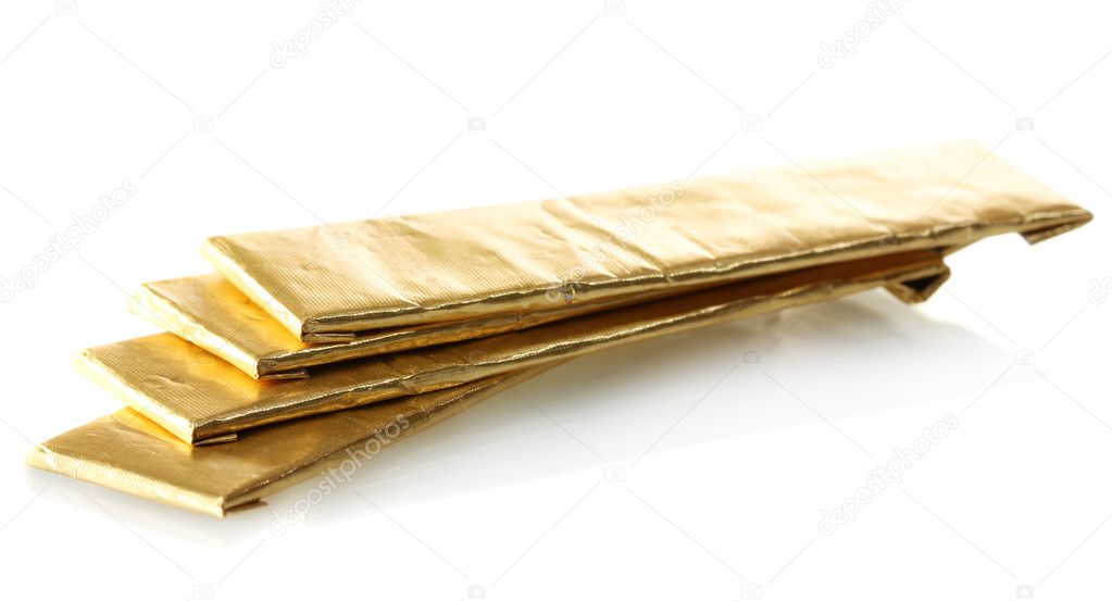 Chewing gums wrapped in golden foil, isolated on white