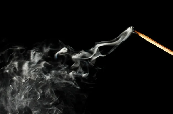 stock image Match with abstract smoke on black background