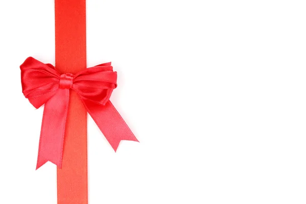Red satin bow and ribbon isolated on white — Stock Photo, Image