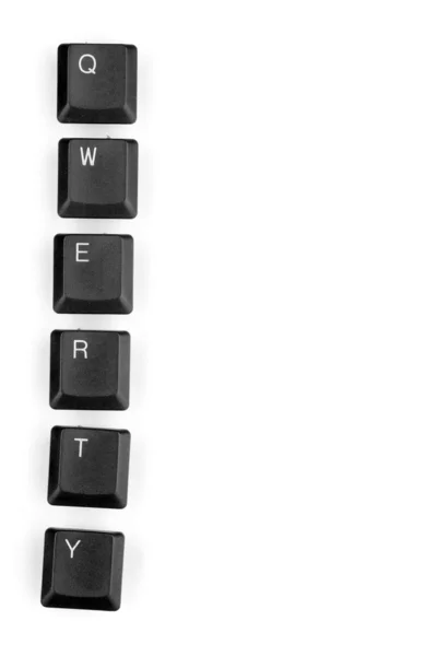 说 qwerty 孤立上白色的键盘键 — 图库照片