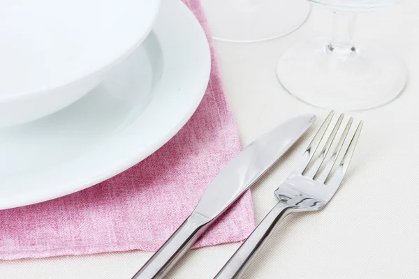 stock image Table setting with fork, knife, plates and napkin