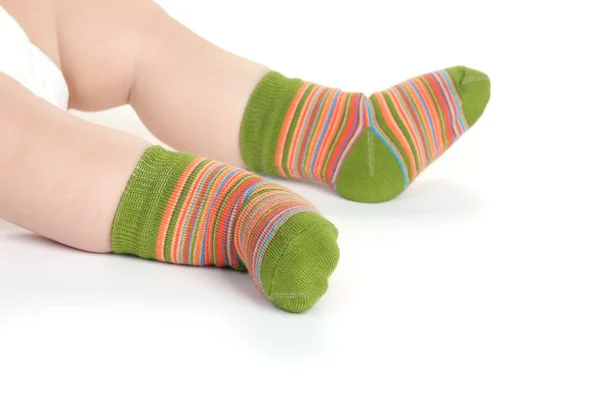 Baby voeten fin sokken geïsoleerd op wit — Stockfoto