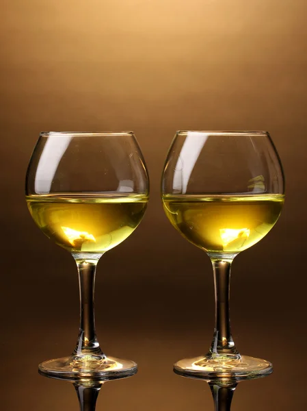 Stock image Wineglass on brown background