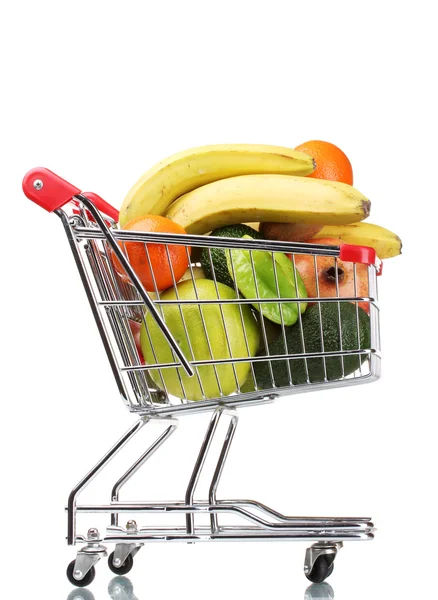 Sortimento de frutas exóticas no carrinho de compras isolado em branco — Fotografia de Stock