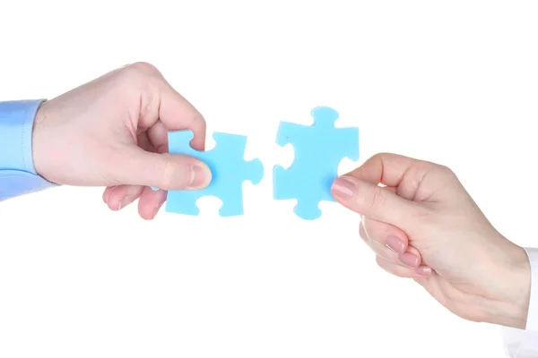 Ruce s puzzle izolovaných na bílém — Stock fotografie