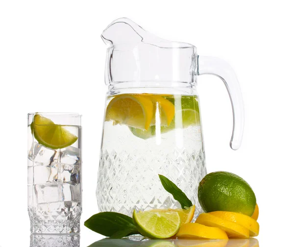 Pitcher and glass of lemonade and lemon isolated on white — Stock Photo, Image