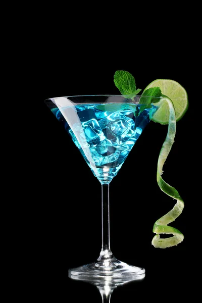 Blue cocktail in glass on black background — Stock Photo, Image