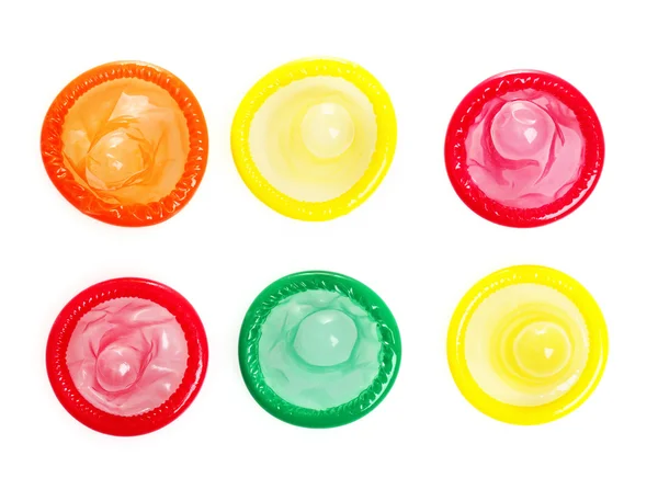 Préservatifs colorés isolés sur blanc — Photo