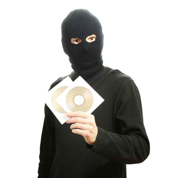 Bandit in black mask with CD disks isolated on white — Stock Photo, Image